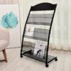 MS Black Magazine Newspaper Stand with 3 levels, Back Support and Rotating Wheels - Image 5